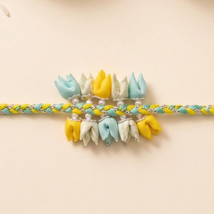 Handmade Pastel Coloured Dual-Tier Tulip Bud & Pearl Silk Rakhi For Brother With Roli Chawal