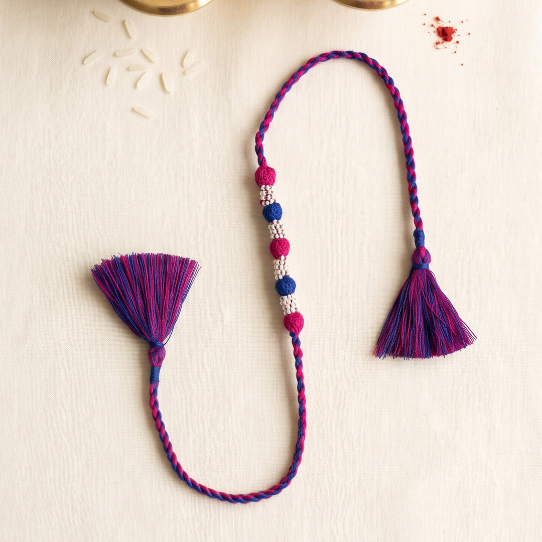 Handmade Reusable Rani Pink And Blue Beaded Patwa Rakhi For Brother