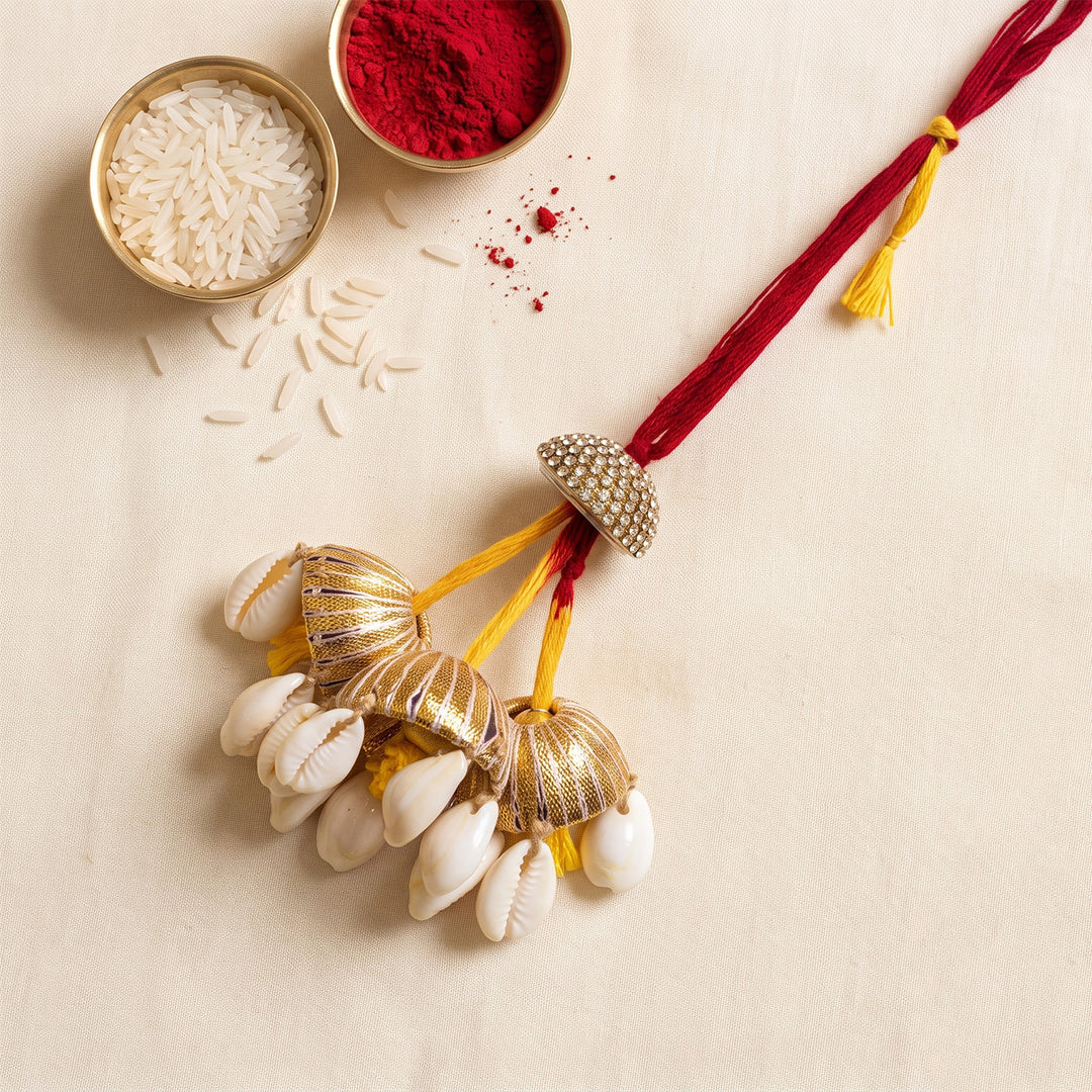 Gold Shell Hanging Lumba Rakhi With Roli Chawal For Sister/Bhabhi