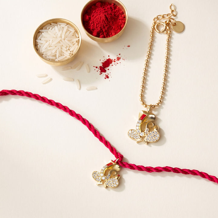 Divine Ganesha Gold Plated Sterling Silver Rakhi & Lumba Set With Roli Chawal For Bhaiya Bhabhi | Set of 2