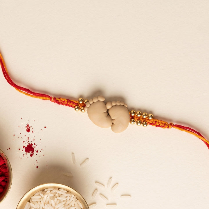 Handmade Baby Feet Charm Polymer Clay Rakhi With Roli Chawal For Newborns