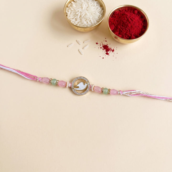 Swan Mother of Pearl Rakhi For Brother With Roli Chawal