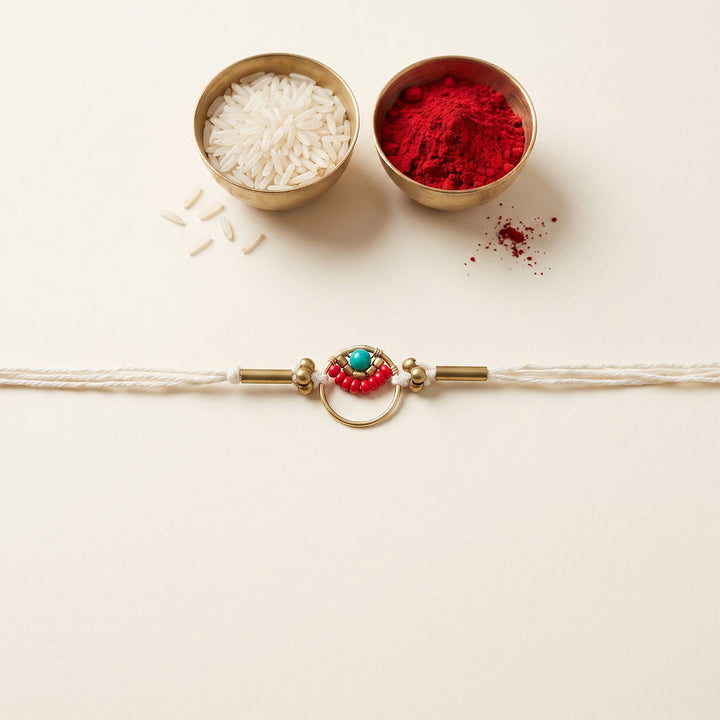 Handcrafted Circle Of Life Brass Rakhi With Roli Chawal For Brother