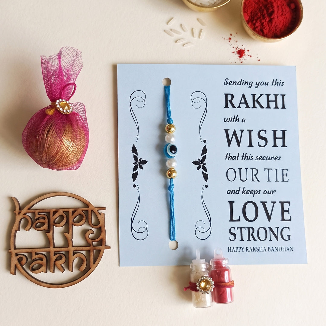 Handmade Evil Eye Blue Premium Agate Rakhi With Roli Chawal, Nariyal And Gift Box For Brother
