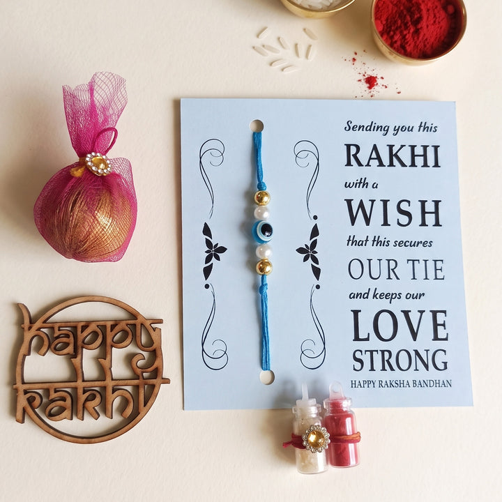 Handmade Evil Eye Blue Premium Agate Rakhi With Roli Chawal, Nariyal And Gift Box For Brother