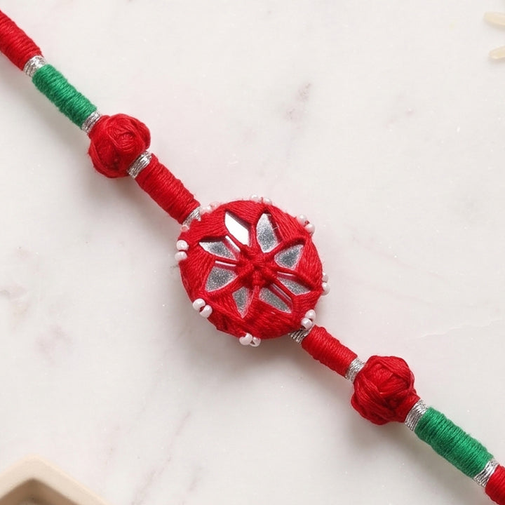 Handmade Mirror Work Patwa Maroon Cotton Rakhi With Roli Chawal