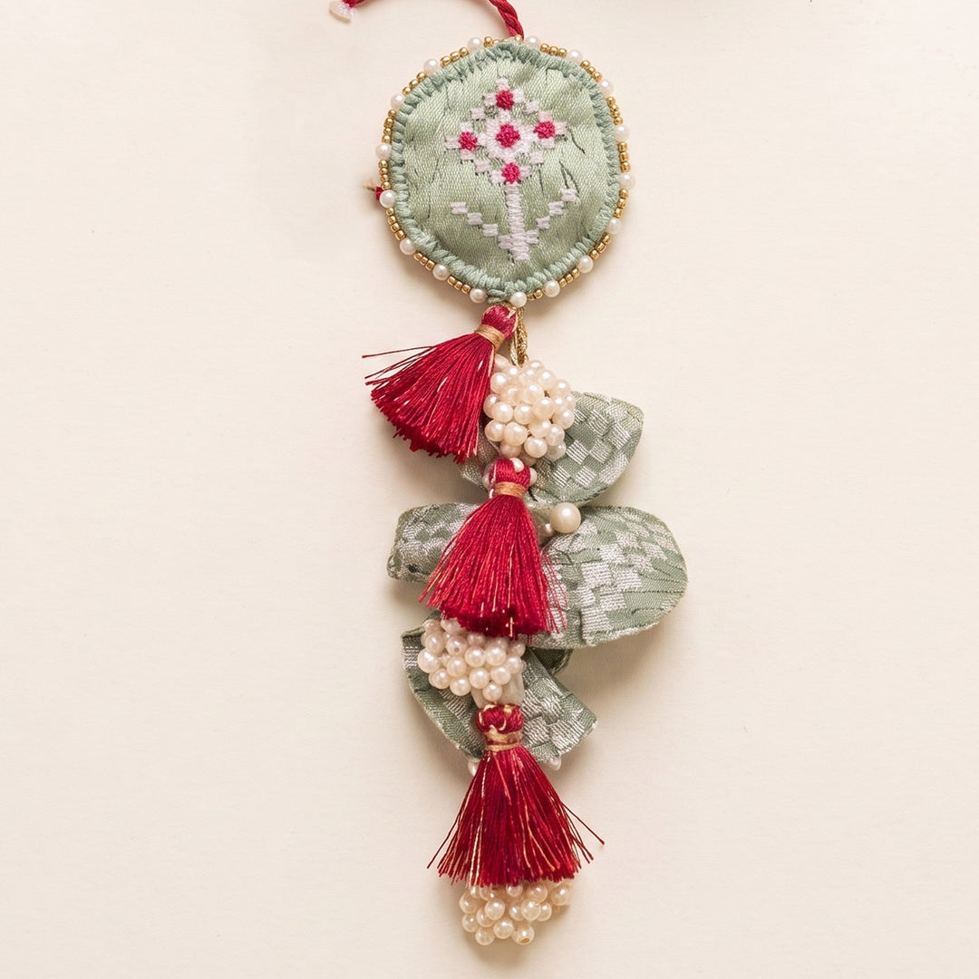 Handcrafted Pearl, Tassel & Thread Work Cheed Heavy Lumba Rakhi for Bhabhi - Mint Green
