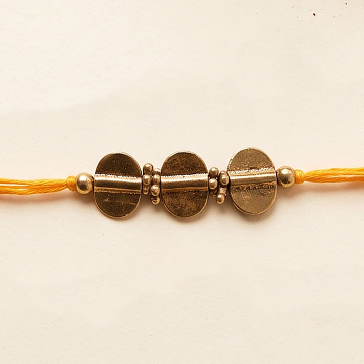 Beaded Diamond & Charm Brass Rakhi With Roli Chawal For Brother