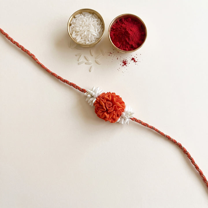 Handcrafted Rose & Mogra Bud Silk Fabric Floral Rakhi For Brother With Roli Chawal