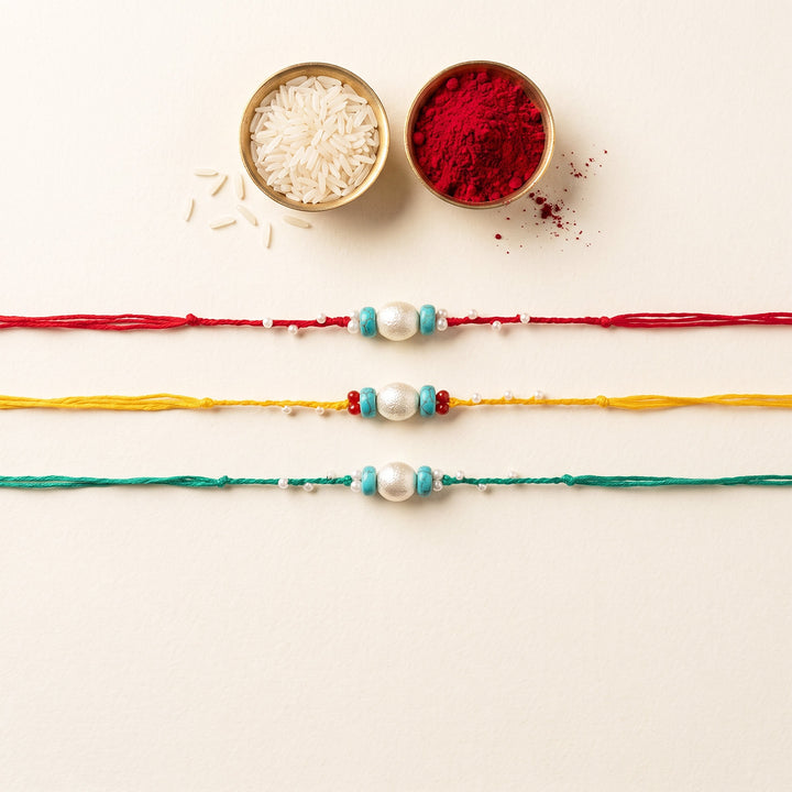 Handcrafted Pearls & Stones Rakhi With Roli Chawal For Brother | Set of 3