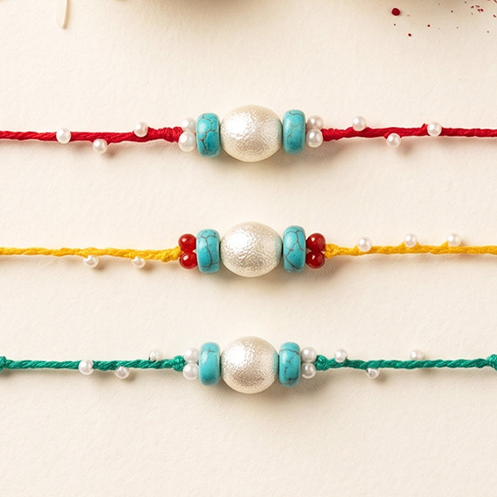 Handcrafted Pearls & Stones Rakhi With Roli Chawal For Brother | Set of 3