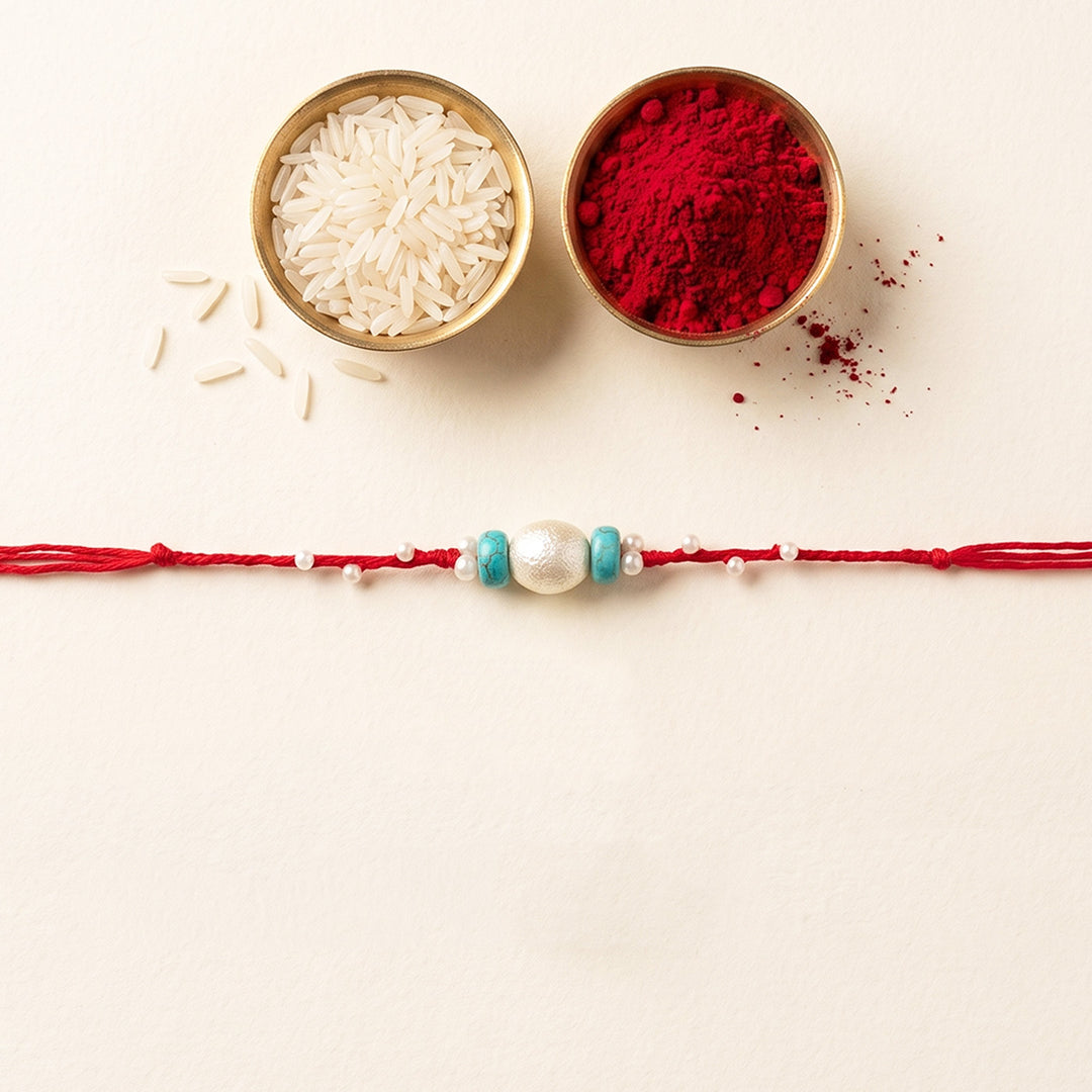 Handcrafted Pearls & Stones Rakhi With Roli Chawal For Brother