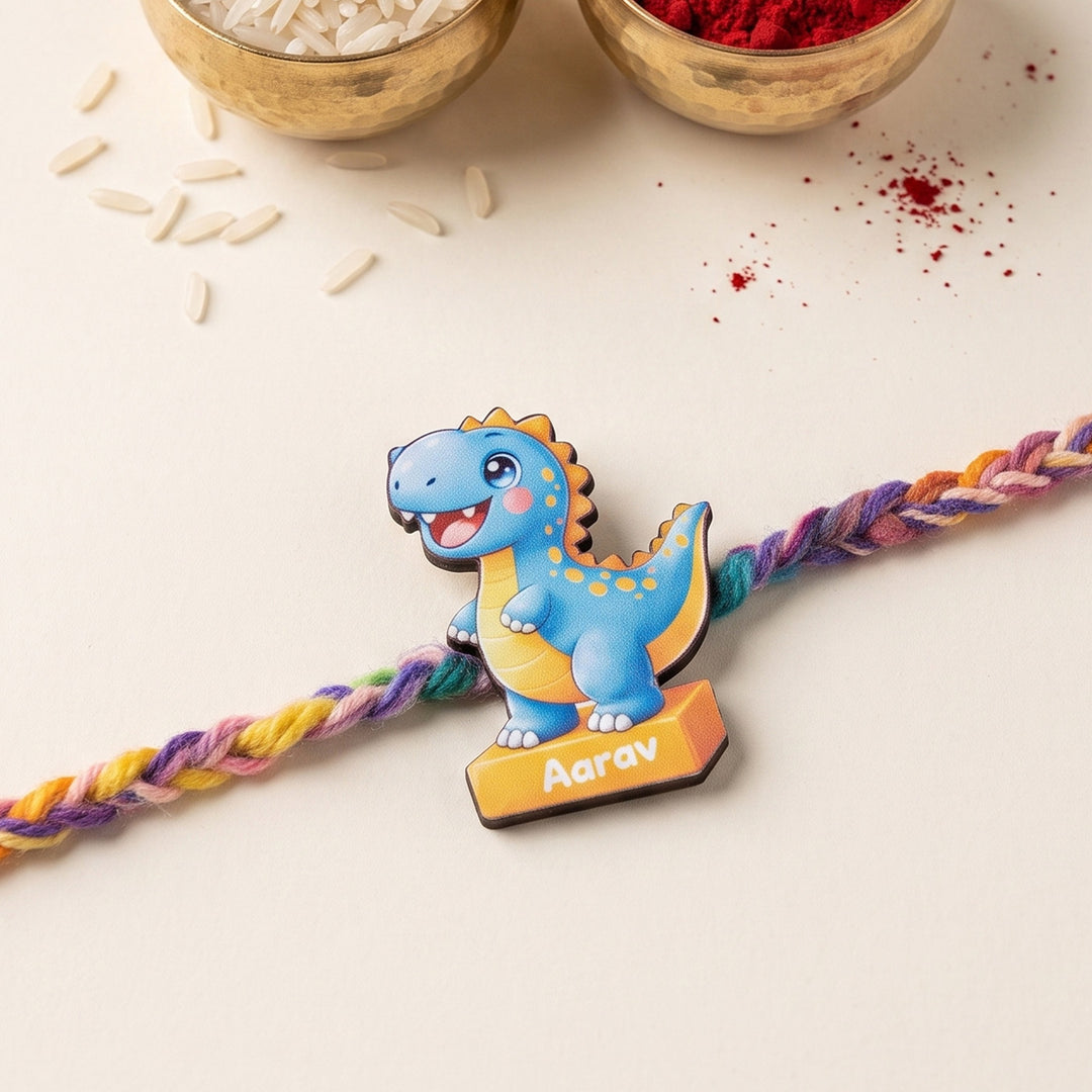 Personalized Reusable Blue Dino MDF Wood Rakhi With Roli Chawal