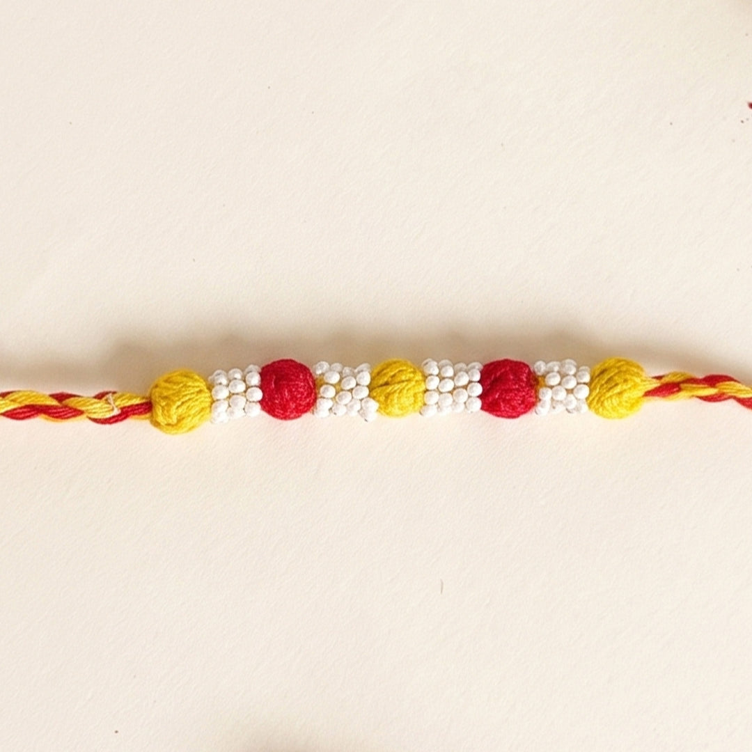 Handmade Reusable Red And Bright Yellow Beaded Patwa Rakhi For Brother