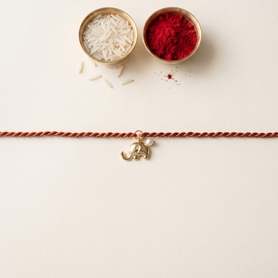 Cute Elephant With Pearl Gold Plated Sterling Silver Charm Rakhi With Roli Chawal For Brother