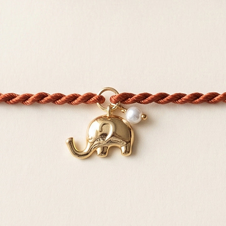 Cute Elephant With Pearl Gold Plated Sterling Silver Charm Rakhi With Roli Chawal For Brother