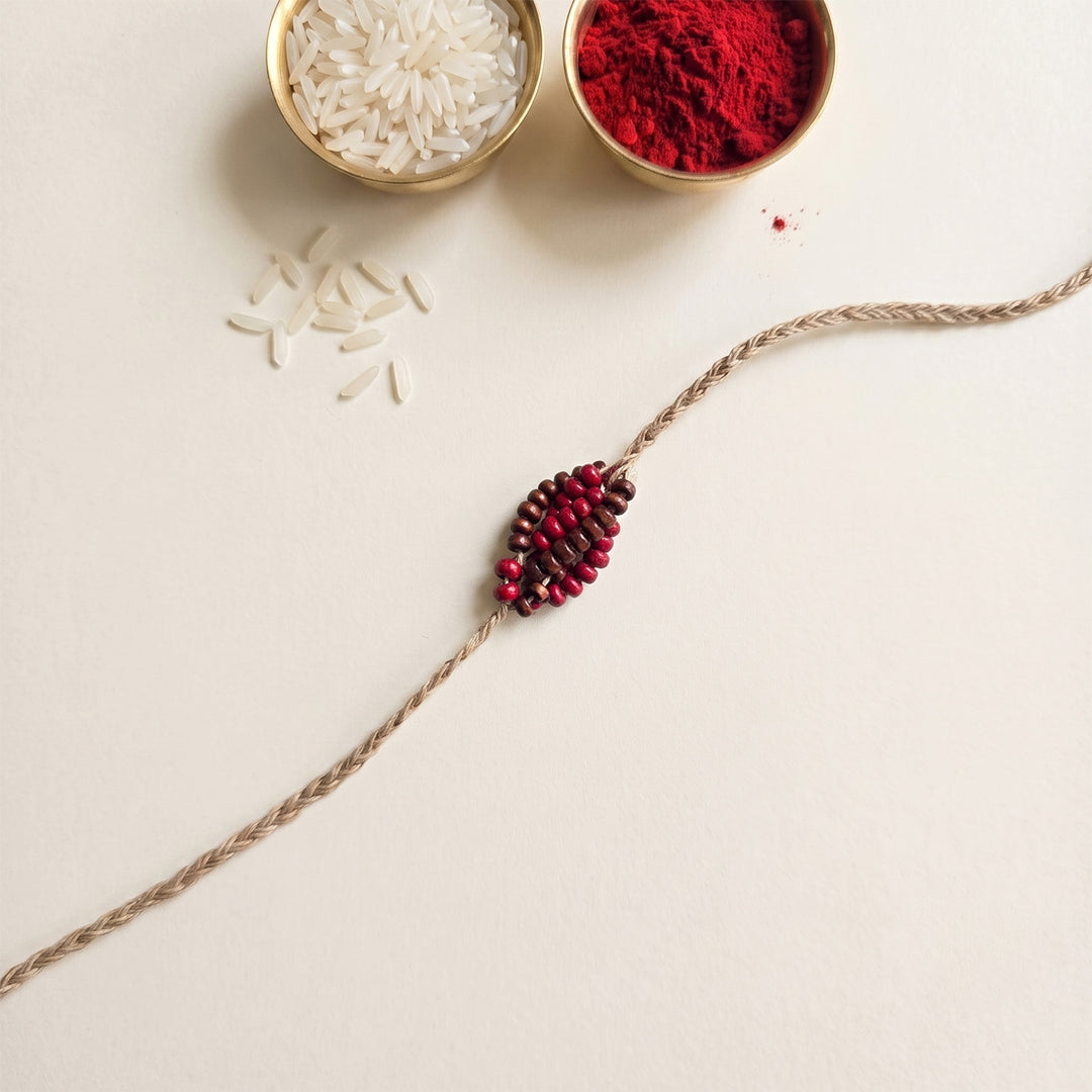 Handcrafted Jute Thread Brown & Red Wood Bead Rakhi For Brother