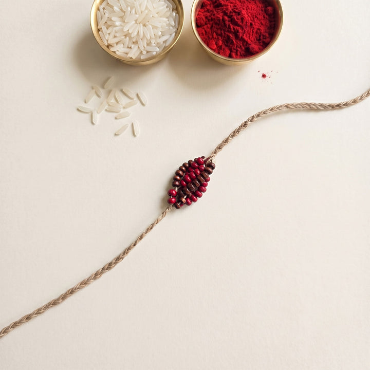 Handcrafted Jute Thread Brown & Red Wood Bead Rakhi For Brother