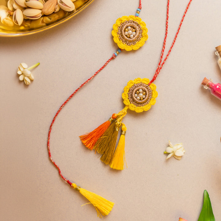 Intricate Crochet Marigold Bhaiya Bhabhi Rakhi-Lumba Set With Roli Chawal | Set of 2