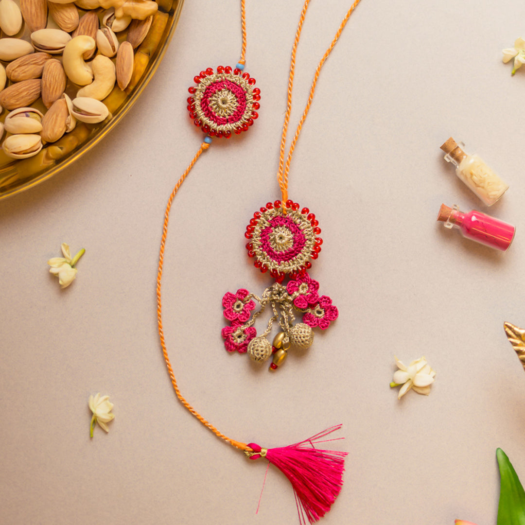 Intricate Crochet Pink Twilight Bhaiya Bhabhi Rakhi-Lumba Set With Roli Chawal | Set of 2