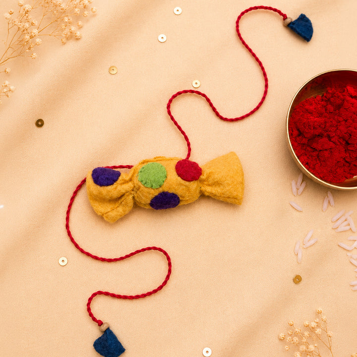 Hand Embroidered Toffee Rakhi With Keychain For Brother