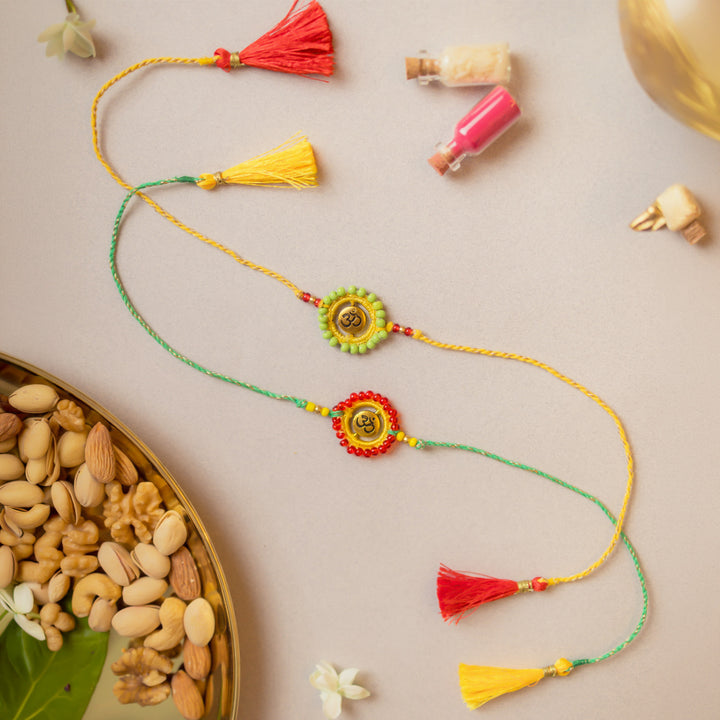 Intricate Beaded Crochet Om Aura Rakhi With Roli Chawal | Set of 2