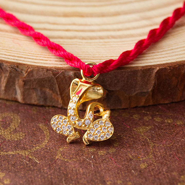 Divine Ganesha Gold Plated Sterling Silver Charm Rakhi With Roli Chawal For Brother