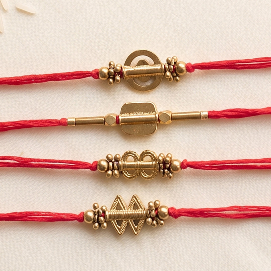 Beaded Shield & Bloom Brass Rakhi With Roli Chawal For Brother | Set of 4