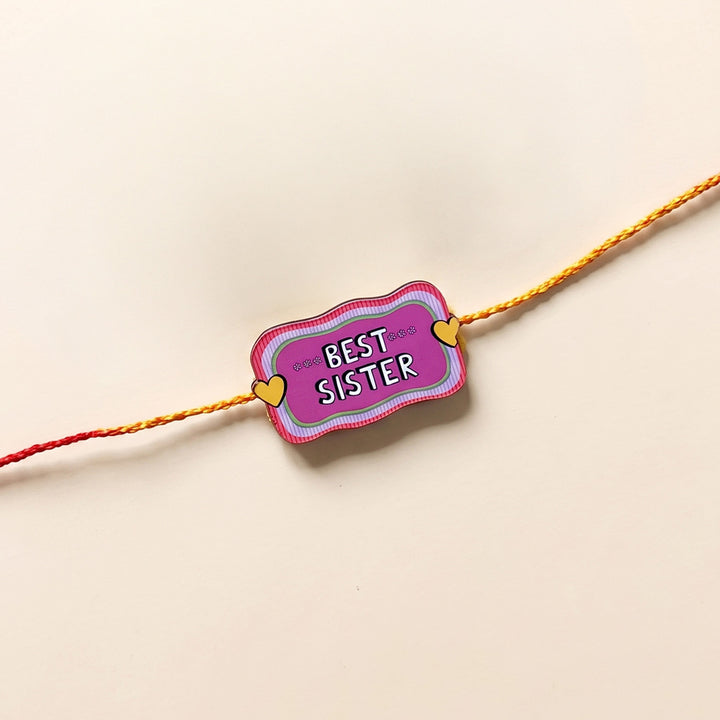 Glossy Printed Wooden 'Best Sister' Rakhi With Kumkum Rice For Sister