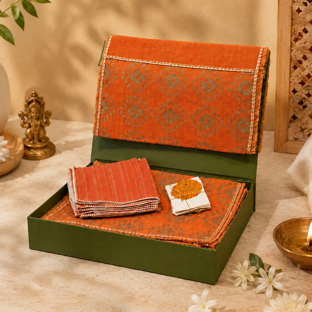 Handcrafted Orange Screen Printed Jute Table Linen Gift Hamper With Gota Detailing For Festive Gifting