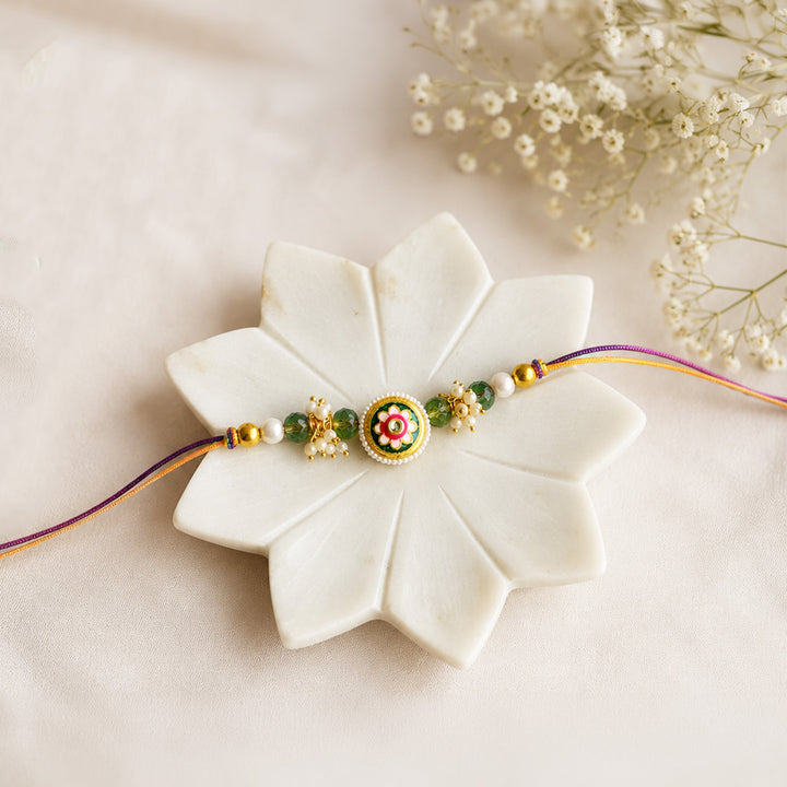 Hand-Knotted Green Meenakari Beaded Rakhi For Brother