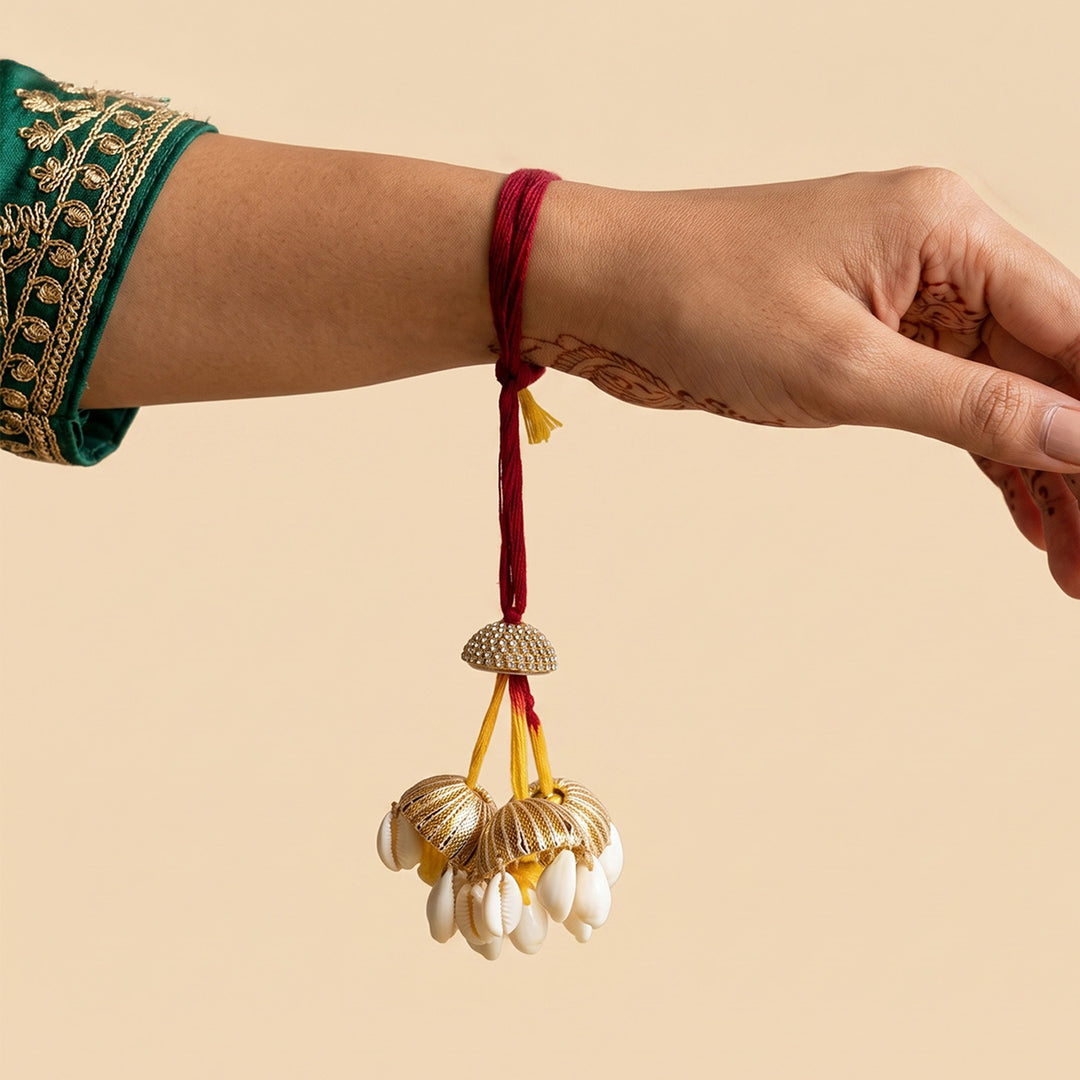 Gold Shell Hanging Lumba Rakhi With Roli Chawal For Sister/Bhabhi