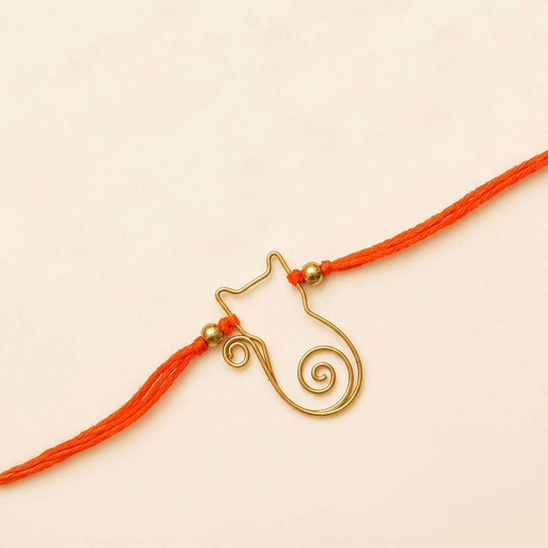 Handcrafted Wired Brass Charm Rakhi With Roli Chawal For Brother