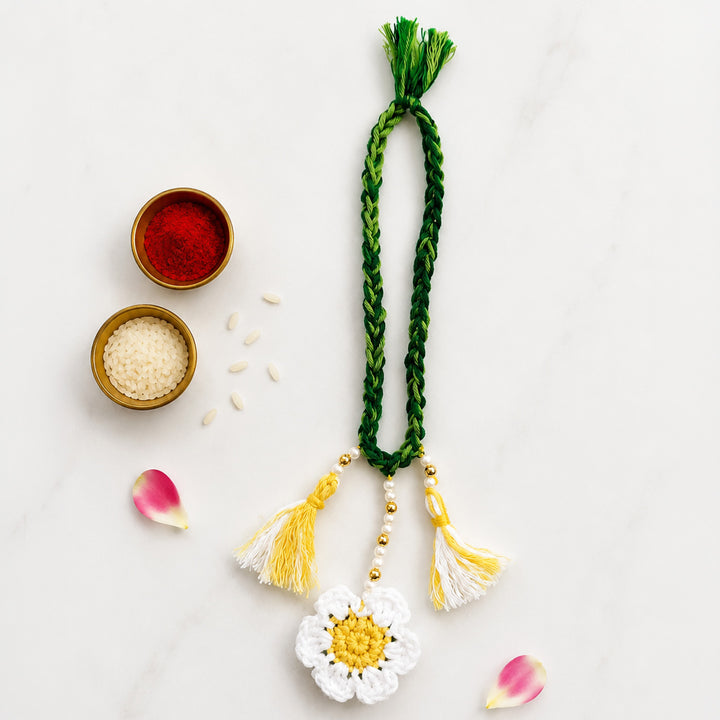 Handmade Crochet Daisy Lumba Rakhi For Bhabhi With Roli Chawal