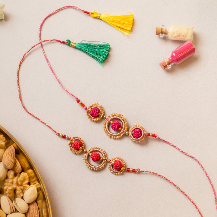 Intricate Beaded Crochet Sacred Loop Rakhi With Roli Chawal | Set of 2