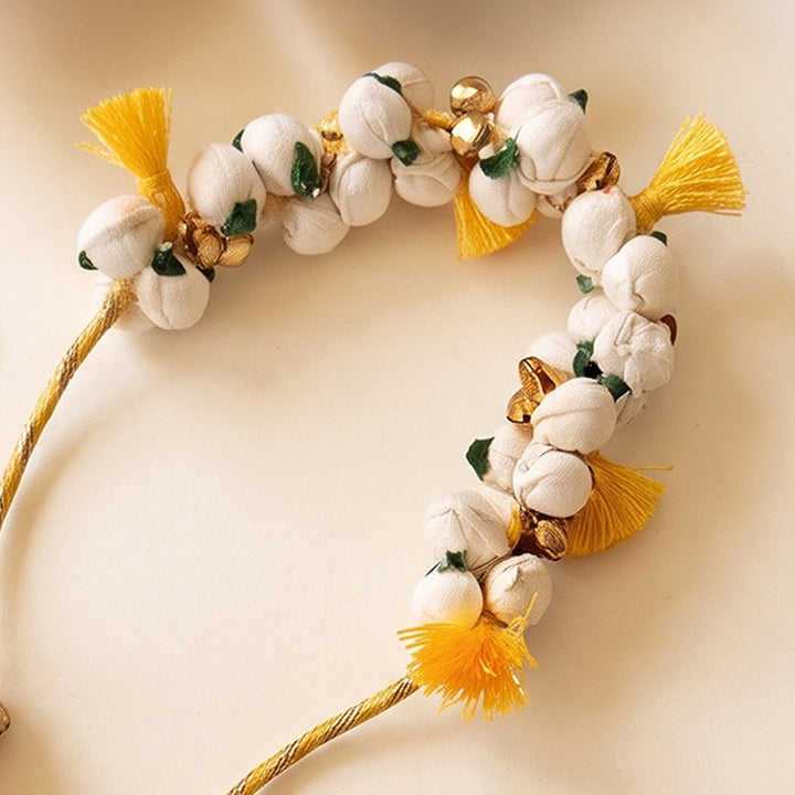 Handcrafted Shola & Ghungroo Tassel Lumba Rakhi for Bhabhi - Yellow
