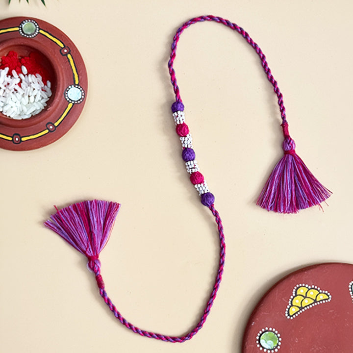 Handmade Reusable Rani Pink And Purple Beaded Patwa Rakhi For Brother