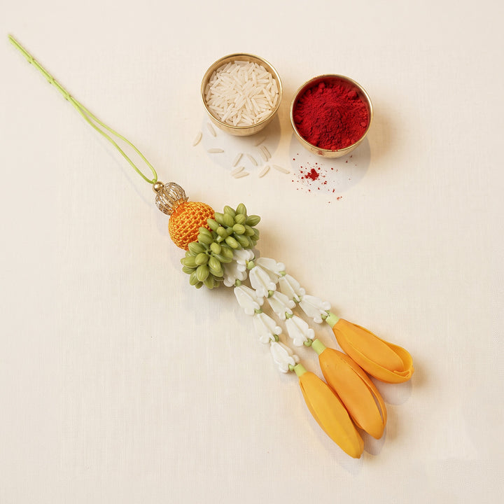 Yellow-White Champa Flower Clay Lumba Rakhi With Roli Chawal For Sister/Bhabhi
