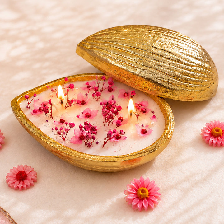 Handcrafted Golden Blossom Almond Shaped Brass Urli Amber Scented Soy Wax Candle With Dried Flowers