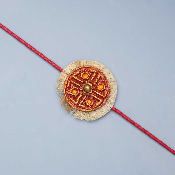 Handmade Papier Mache Red Swastika Rakhi With Roli Chawal
