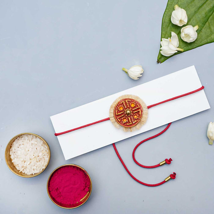 Handmade Papier Mache Red Swastika Rakhi With Roli Chawal