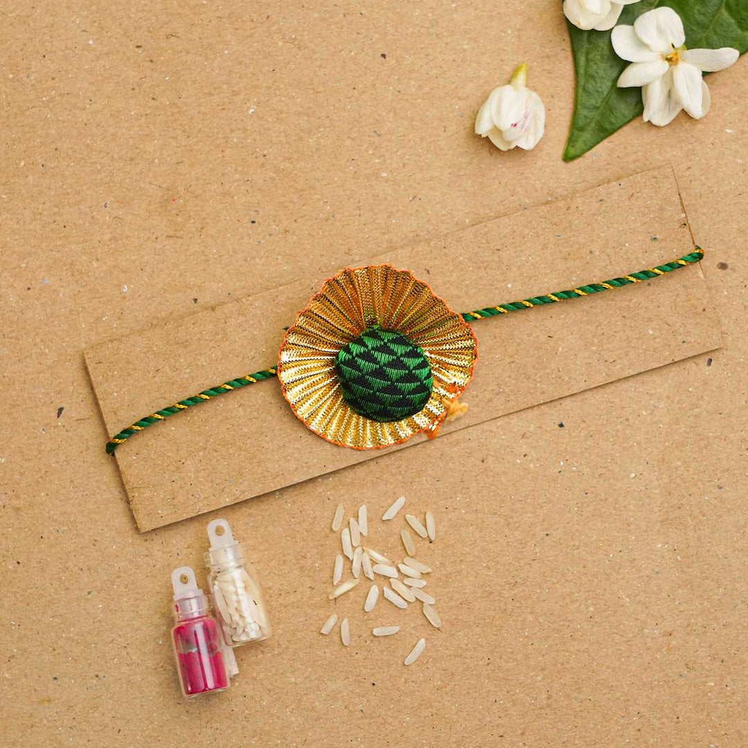 Handmade Pom Pom Khan Silk Rakhi With Chocolates & Roli Chawal