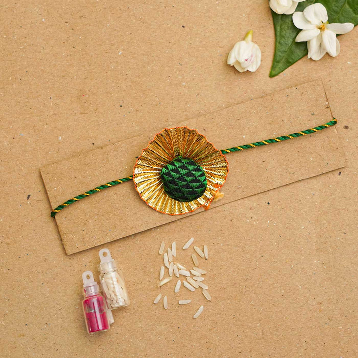 Handmade Pom Pom Khan Silk Rakhi With Chocolates & Roli Chawal
