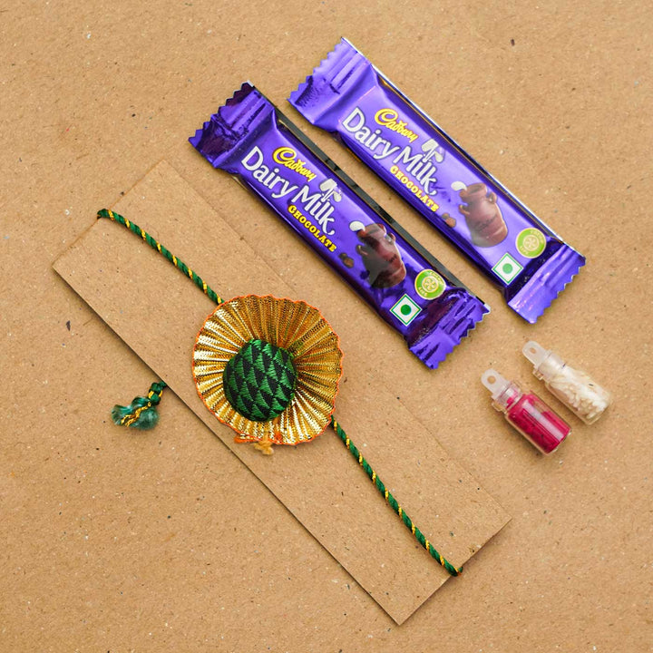 Handmade Pom Pom Khan Silk Rakhi With Chocolates & Roli Chawal