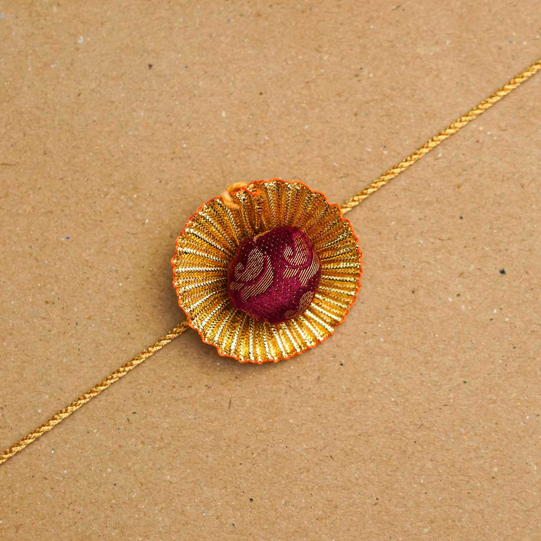Handmade Pom Pom Khan Silk Rakhi With Chocolates & Roli Chawal