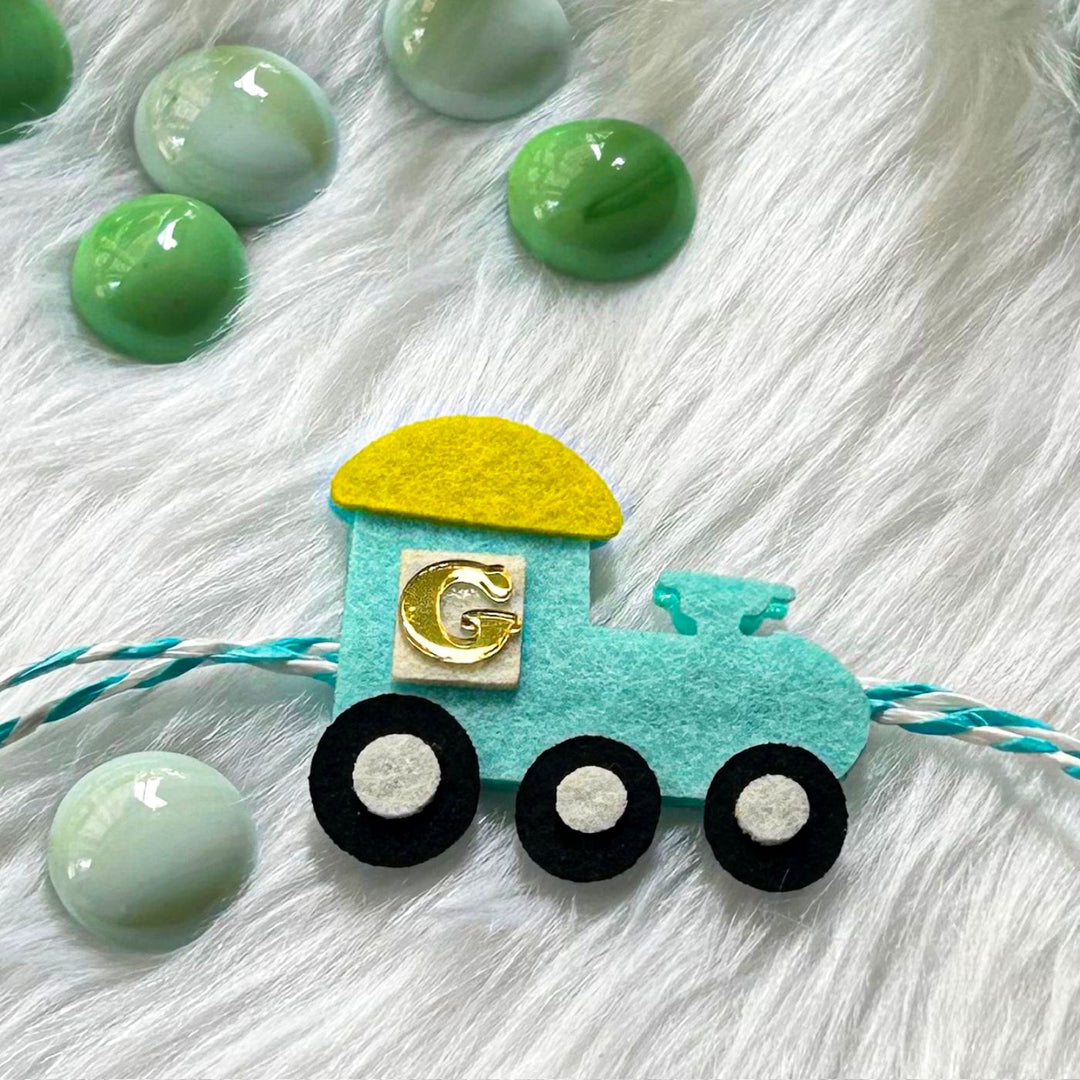 Personalized Laser Cut Cute Cruiser Shape Felt Kids Rakhi With Initial