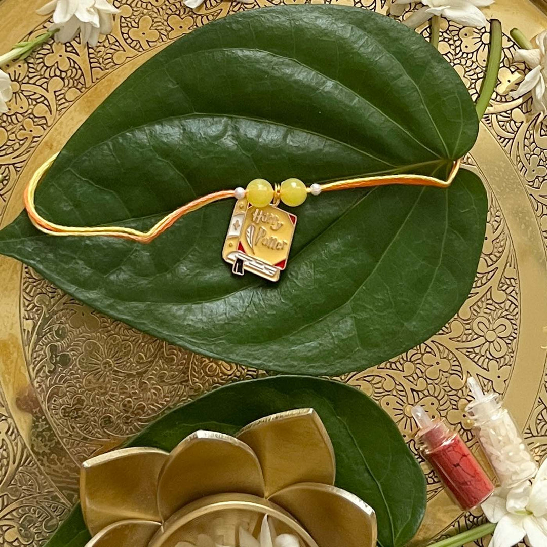 Engraved Harry Potter Enamel Metal Charm Rakhi With Roli Chawal for Brother