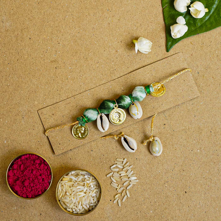 Handmade Tie & Dye Green Kodi Shell & Fabric Bracelet Rakhi With Roli Chawal For Bhabhi
