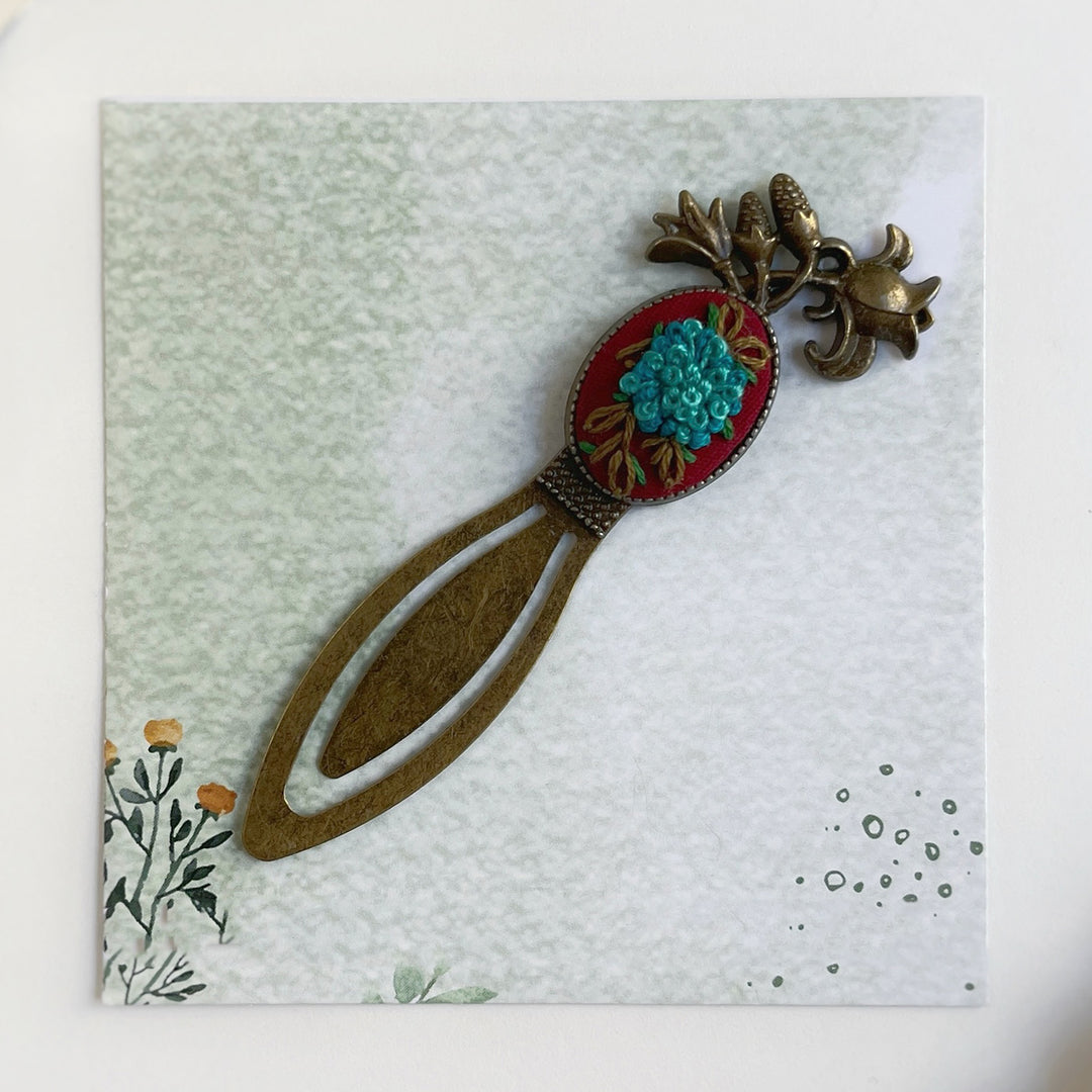 Hand Embroidered Tales In Teal Bronze Bookmark