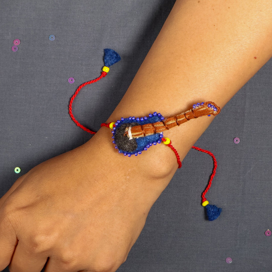 Hand Embroidered Guitar Rakhi With Keychain For Brother